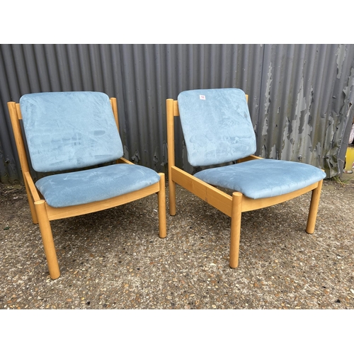 168 - A pair of ercol chairs with blue upholstery