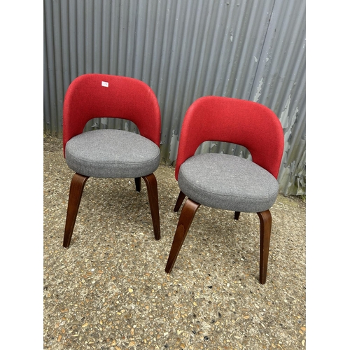 174 - A pair of good quality modern red and grey chairs BY WARRINGS