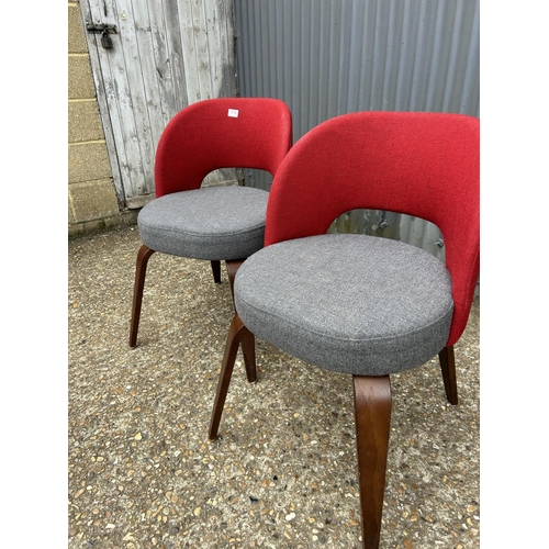 174 - A pair of good quality modern red and grey chairs BY WARRINGS