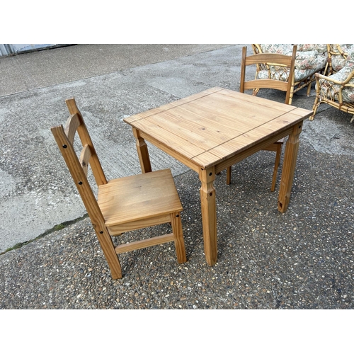 19 - Modern pine table and two chairs