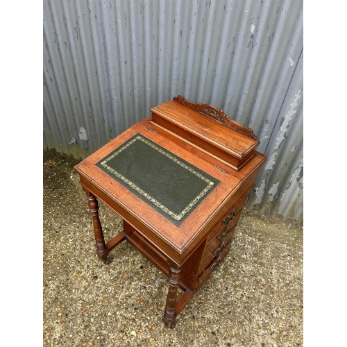 2 - An Edwardian mahogany Davenport desk with four drawers and four dummy drawers