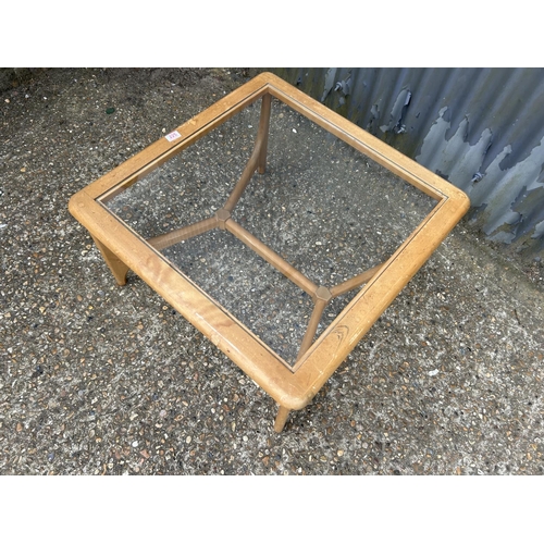 225 - A Nathan teak coffee table 74x 74x 40