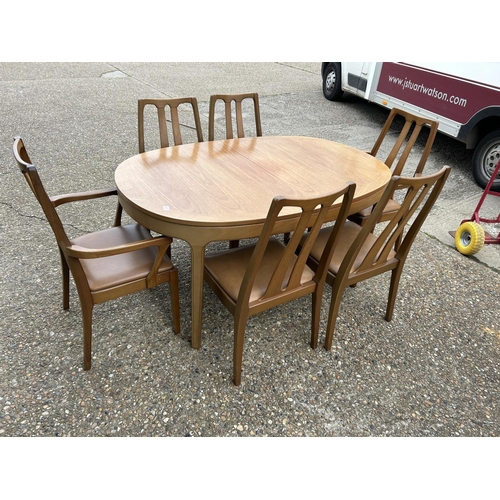 227 - A Mid century Nathan teak extending table with six matching chairs 229x99