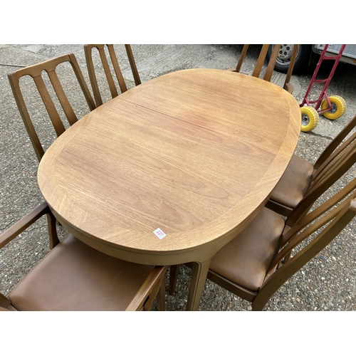 227 - A Mid century Nathan teak extending table with six matching chairs 229x99