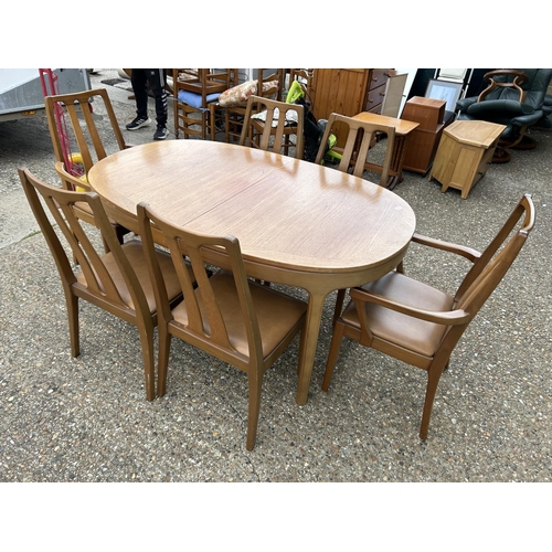 227 - A Mid century Nathan teak extending table with six matching chairs 229x99