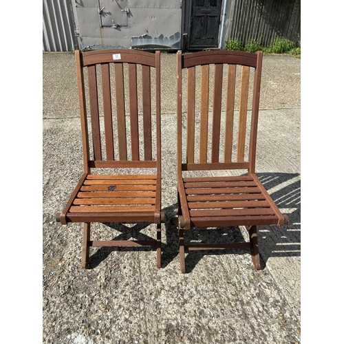 31 - Pair hardwood folding garden chairs