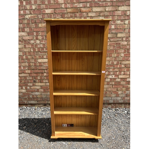 362 - A modern pine open fronted bookcase with adjustable shelves 77x25x175