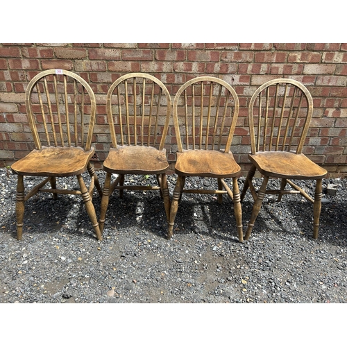 366 - A set of four elm stick back kitchen chairs