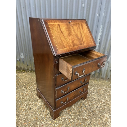 4 - A reproduction mahogany bureau 52cm wide