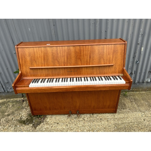 70 - A mid century teak cased SAMICK upright piano 127x50x110