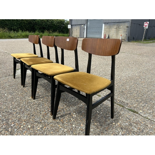 78 - A set of four mid century dining chairs