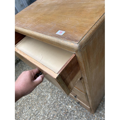 89 - A oak tallboy chest of five 75x46x110