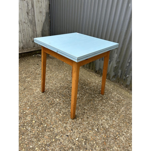 90 - A blue formica kitchen table 74x75