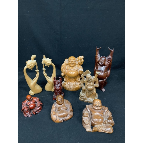 651 - Collection of carved wooden and resin Bhudda figures, tallest 30cms