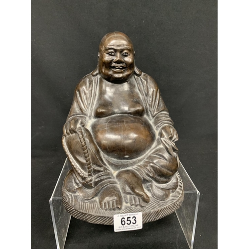 653 - Heavy carved wooden Bhudda, height 26cms