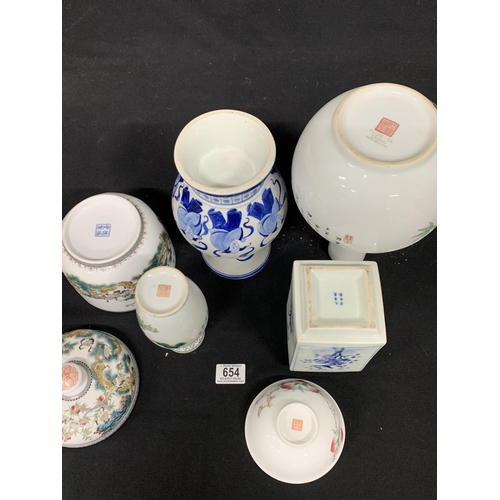 654 - Six pieces of oriental china, tallest 30 cms