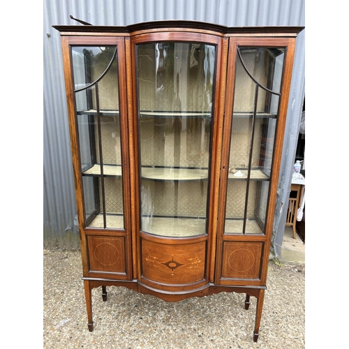 159 - An Edwardian inlaid mahogany display display cabinet with bow glass front 130x30x180