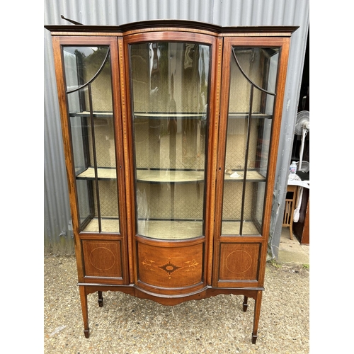 159 - An Edwardian inlaid mahogany display display cabinet with bow glass front 130x30x180