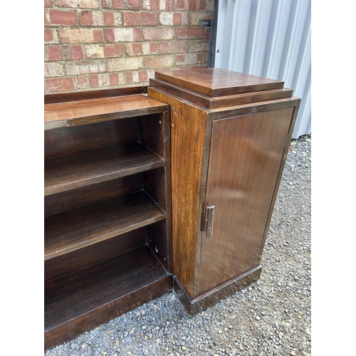 10 - A deco bookcase flanked with a single door  cupboard to each end (separates)