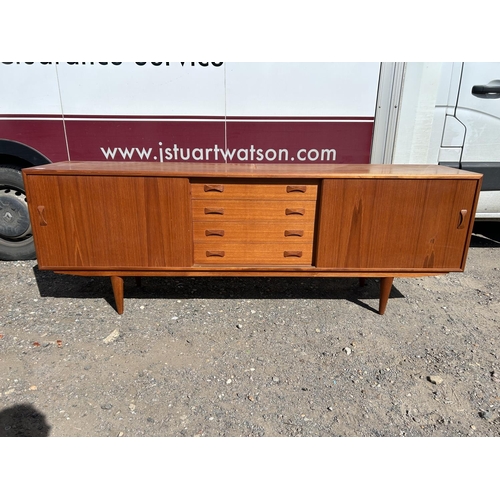 100 - A danish teak sidebaord by DANSK with removable two section cabinet top