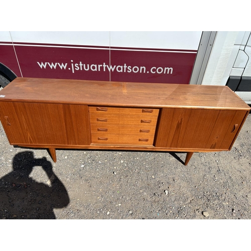 100 - A danish teak sidebaord by DANSK with removable two section cabinet top