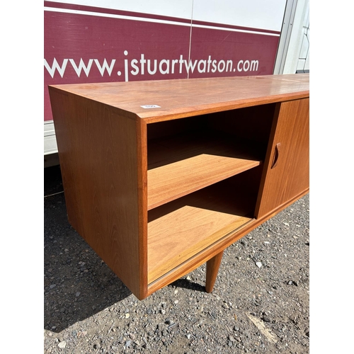 100 - A danish teak sidebaord by DANSK with removable two section cabinet top