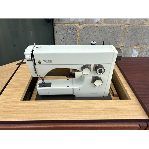 103 - A HUSQUVANA cabinet sewing machine