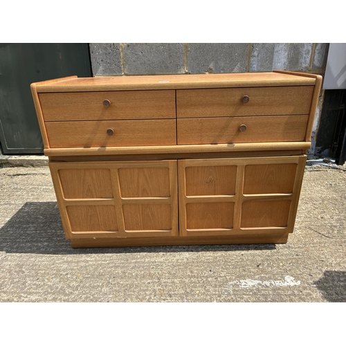 107 - A Nathan teak four drawer sideboard 103x45 x75