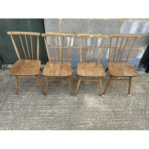 115 - A set of four ercol stick back chairs