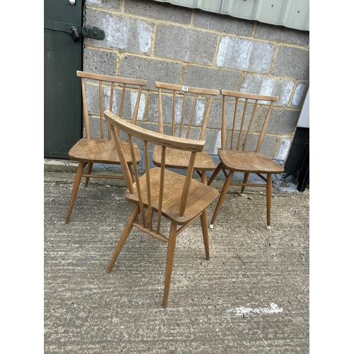 115 - A set of four ercol stick back chairs