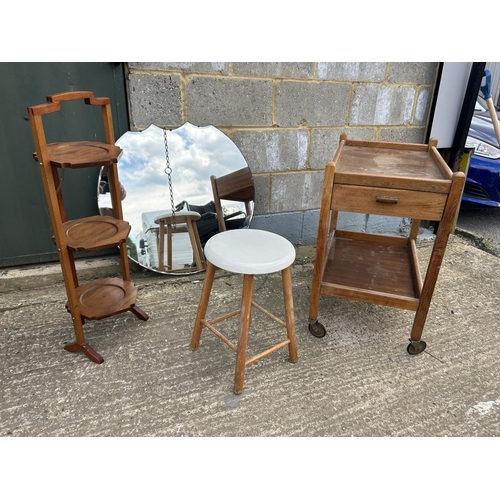 116 - An oak trolley, frameless mirror, cake stand and stool