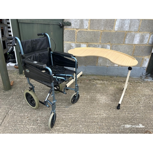 117 - A green folding wheelchair together with adjustable bed table