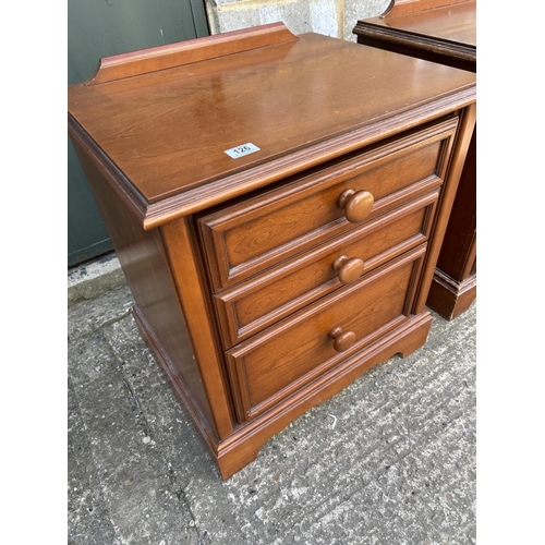 126 - A pair of hardwood three drawer bedsides