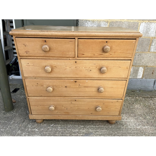 130 - A country pine chest of five drawers 126cm wide