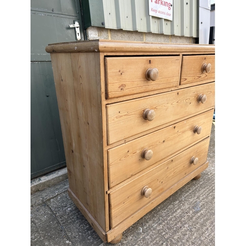 130 - A country pine chest of five drawers 126cm wide