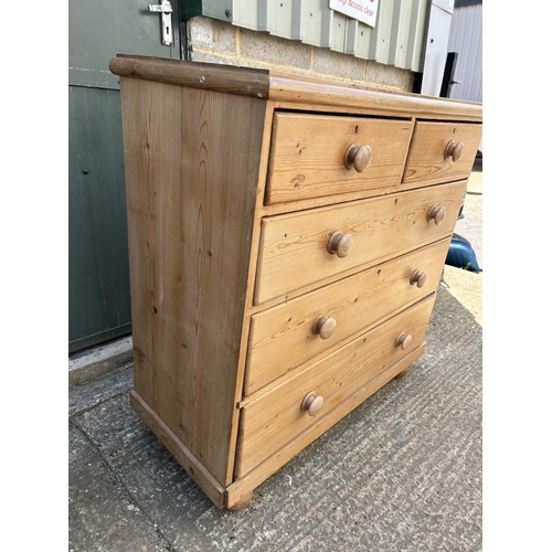 130 - A country pine chest of five drawers 126cm wide