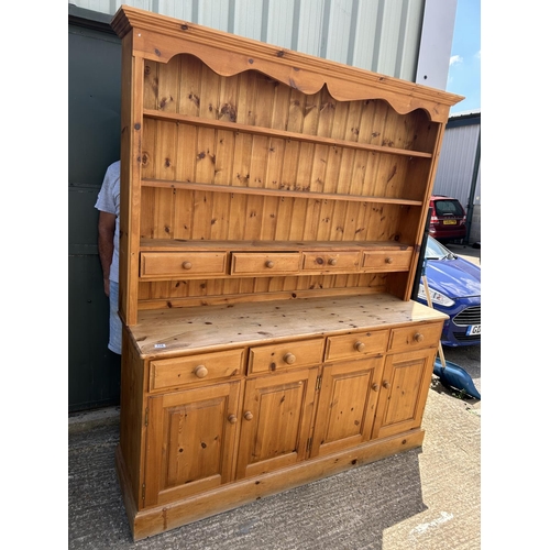 134 - A farmhouse style pine dresser 170x46x200