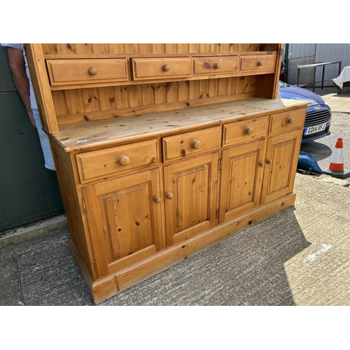 134 - A farmhouse style pine dresser 170x46x200