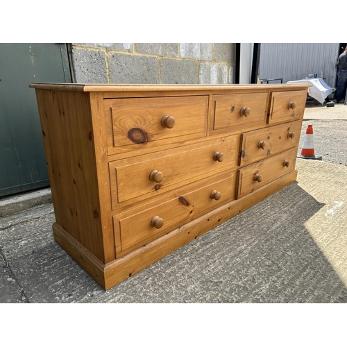 136 - A pine lowboy chest of seven drawers 170x43x77