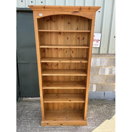 142 - A pine open fromted bookcase 91x35x199