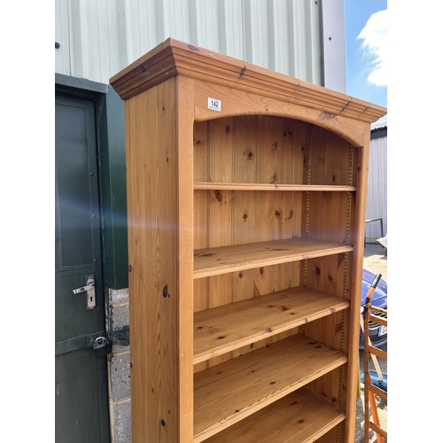 142 - A pine open fromted bookcase 91x35x199