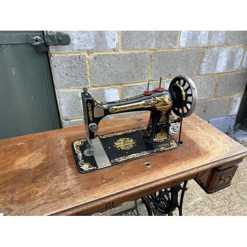 146 - A treddle sewing machine