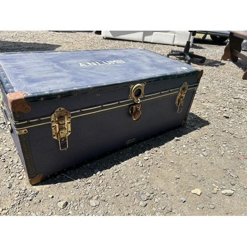 153 - A vintage blue travelling trunk