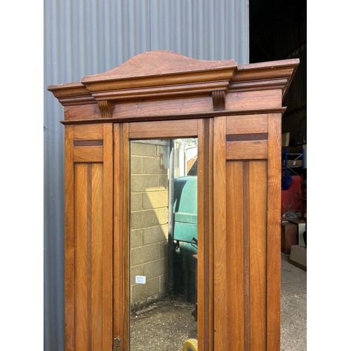 160h - An Edwardian satinwood single door wardrobe 82x40x210