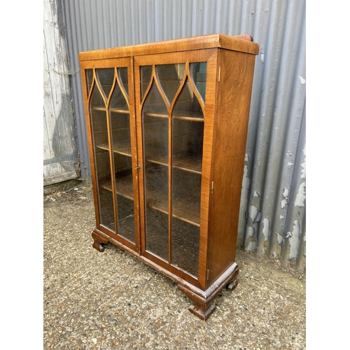 160i - A walnut two door cabinet 83x30x120