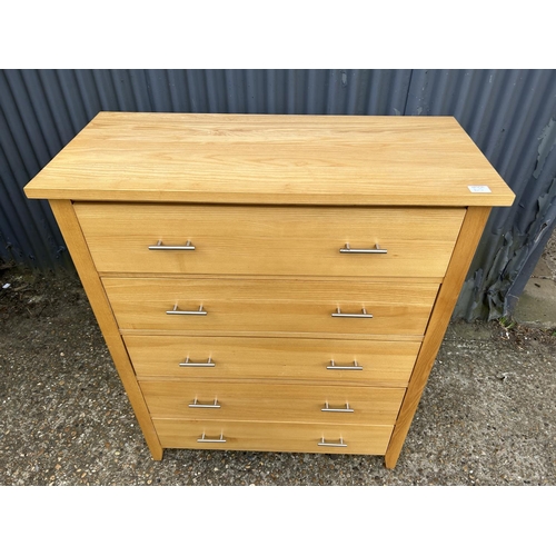 160j - A modern light oak chest of five drawers 96x42 x130