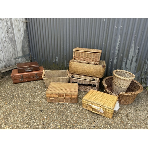 160q - Two leather cases and collection of vintage basketware