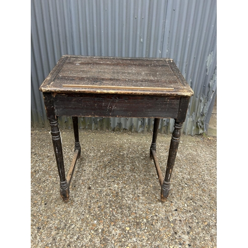 203 - An antique pine teachers desk with lift up top 87x66x100