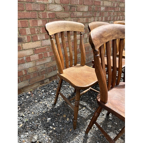 21 - A set of six country pine windsor style chairs