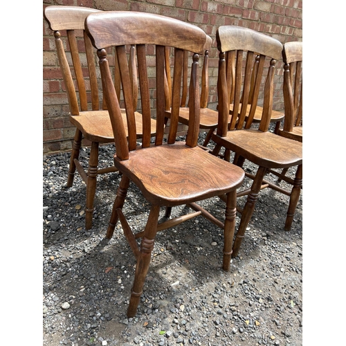 21 - A set of six country pine windsor style chairs